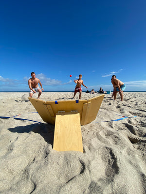 Hunnyball played on a beach by friends