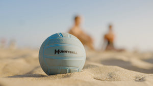 Close up shot of a blue Hunnyball ball on a beach